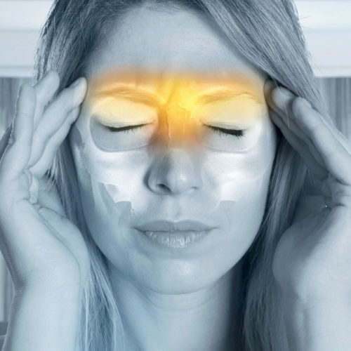 A patient suffering with headaches and migraines. Treatments are available from Tom Claykens at Biddenden Chiropractic.